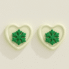 Aretes navideños de copo de nieve verde