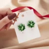 Aretes navideños de moña de regalo verde